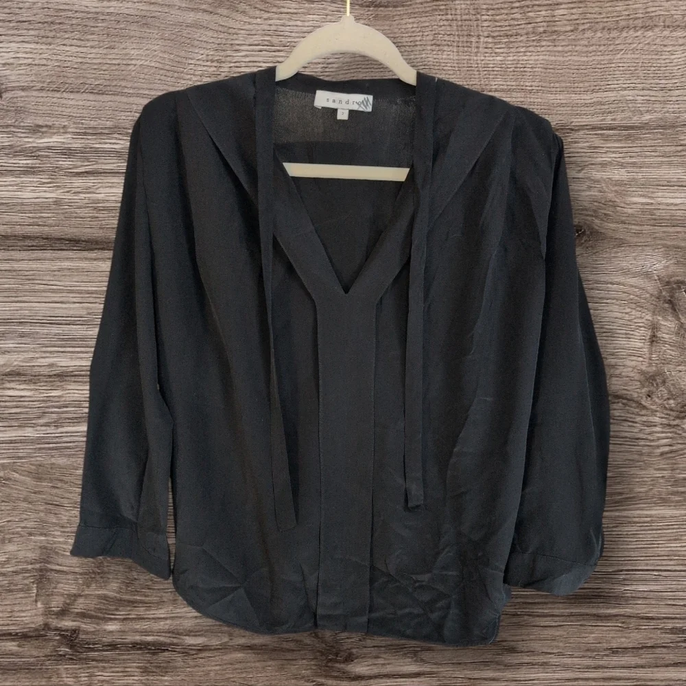 Sandro Paris black Silk blouse , pleated front and sleeves.